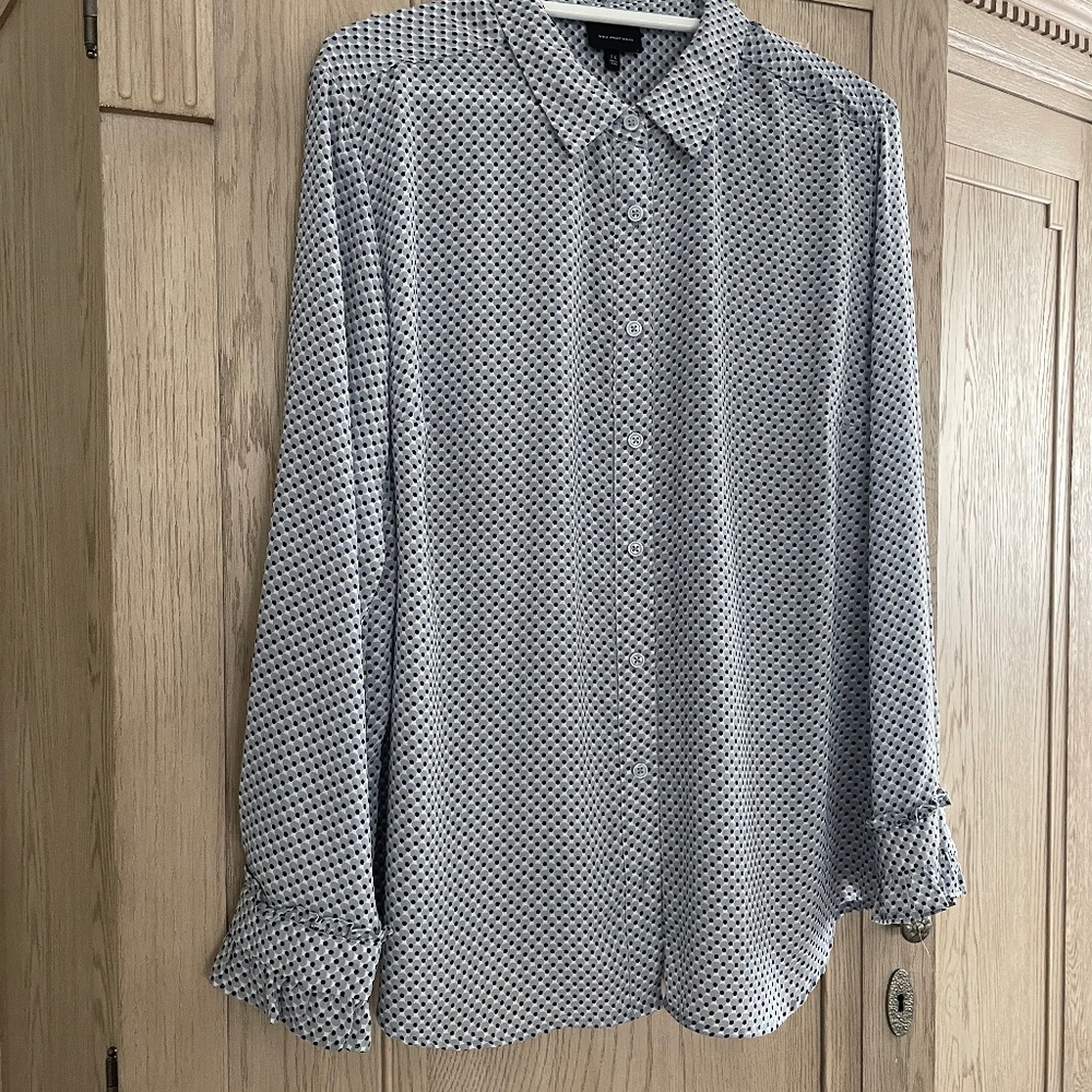 Blue, black, and white blouse